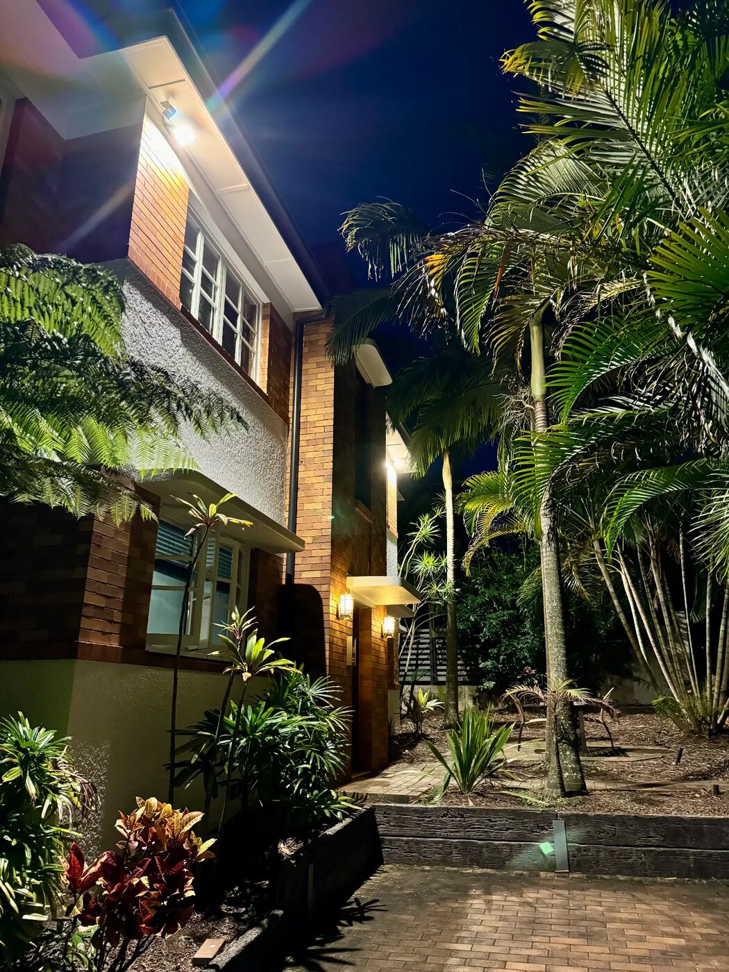 Exterior and garden lighting installed by KBR Electrical on a Brisbane Northside home at night